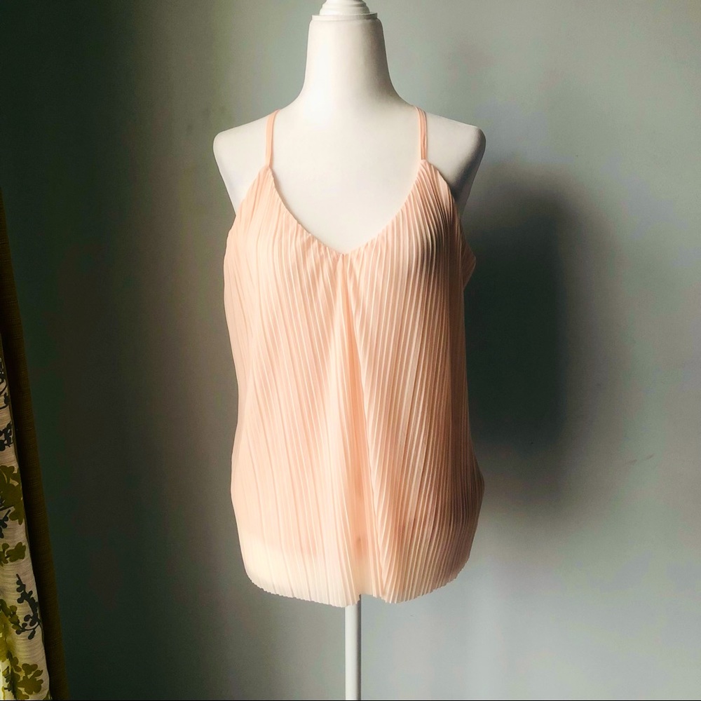 The limited cream color tank top. Size S